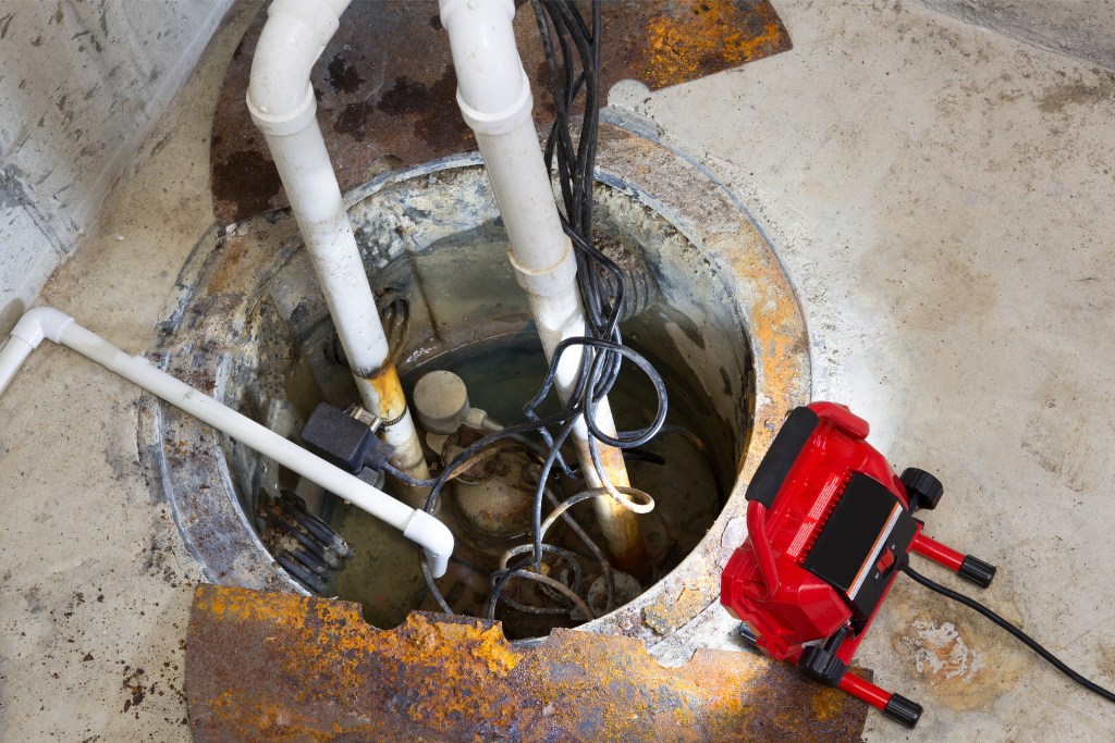 clean a sump pump drain pipe